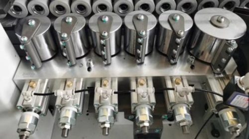 Rulo ép nẹp máy cắt dán xén cạnh tự động - dán laser